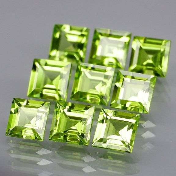 Princess cut 6.91ct apple green Peridot set