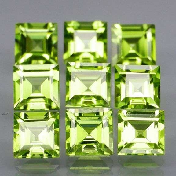 Princess cut 6.91ct apple green Peridot set