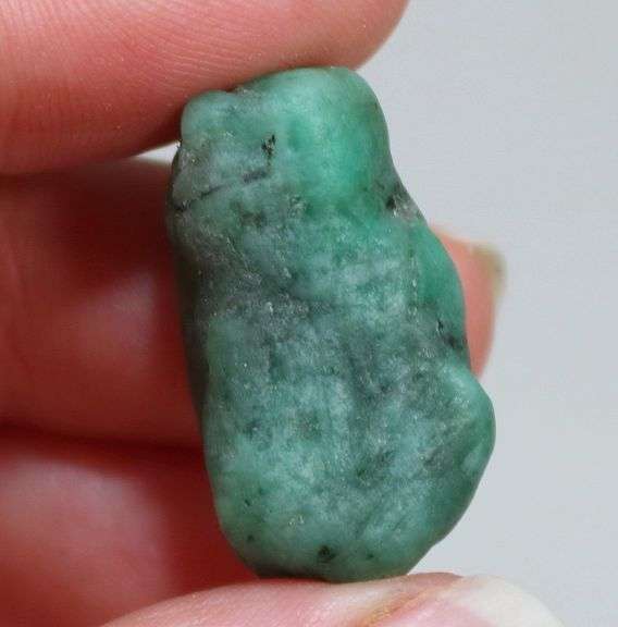 Large 37.81ct raw Emerald in matrix