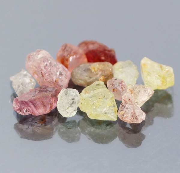 Mixed 13pc. 10.49ct unheated uncut Sapphire set