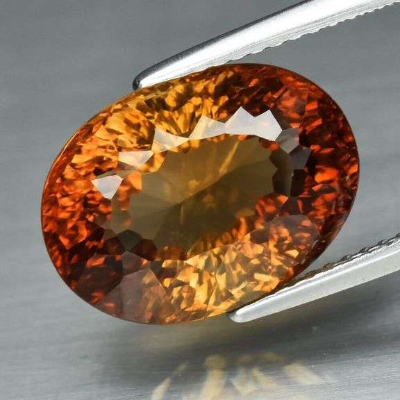 Fiery flashing 9.48ct amber Imperial Topaz