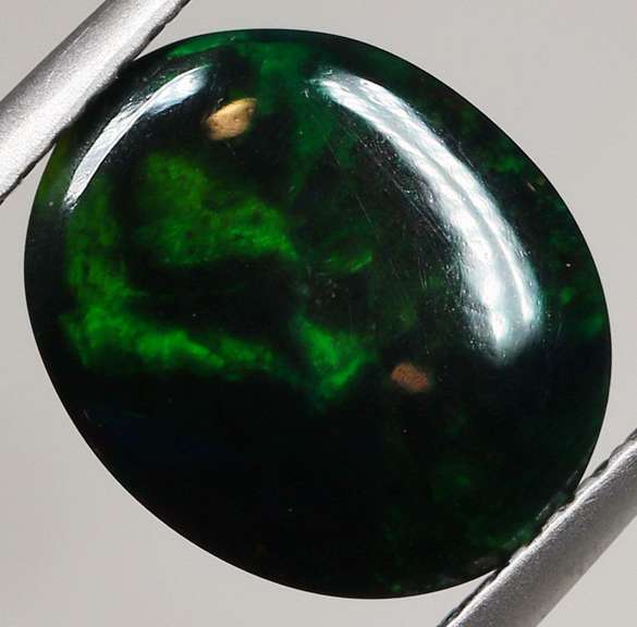 Glistening 2.36ct black Opal cabochon