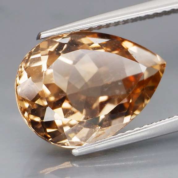 Vivid! 7.69ct pear cut Imperial Topaz