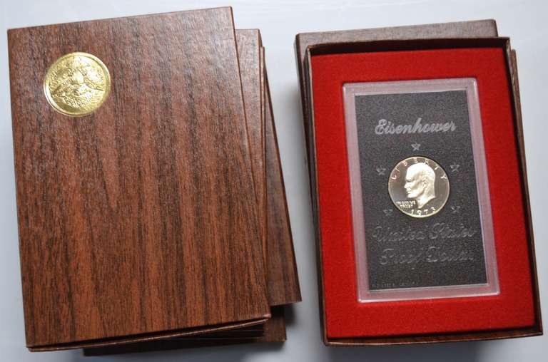8 Brown Box Ike Silver Dollars.