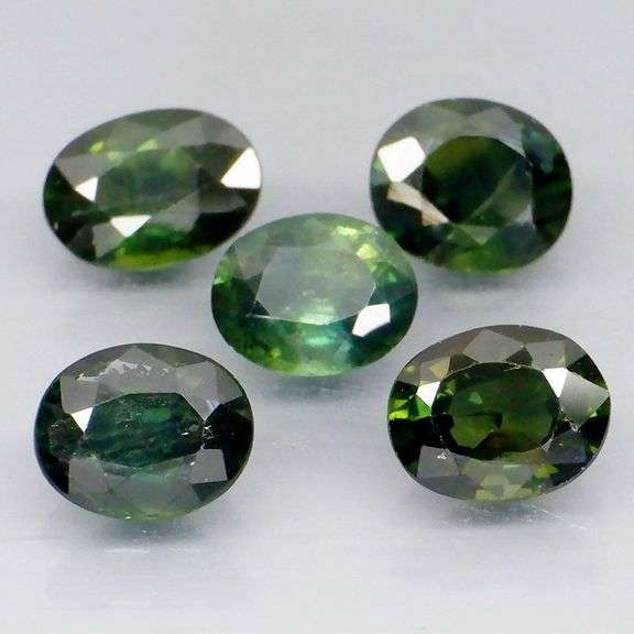 Exotic 3.91ct 5pc green Sapphire set
