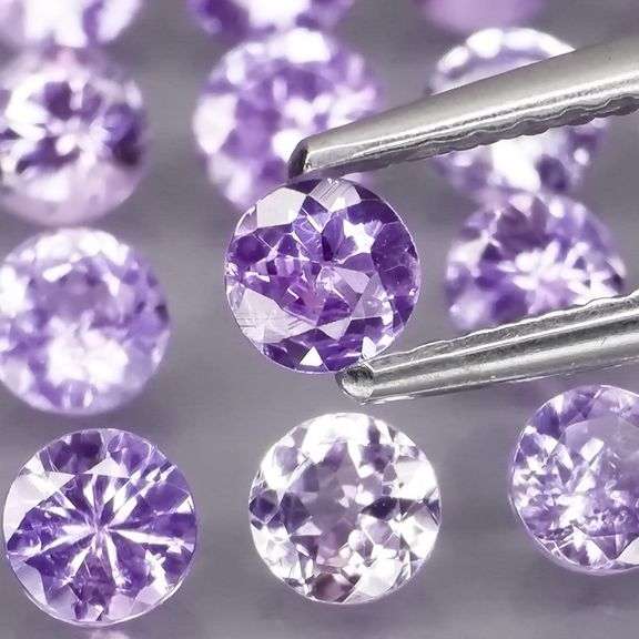 Heavy flashing 3.61ct diamond cut Tanzanite set