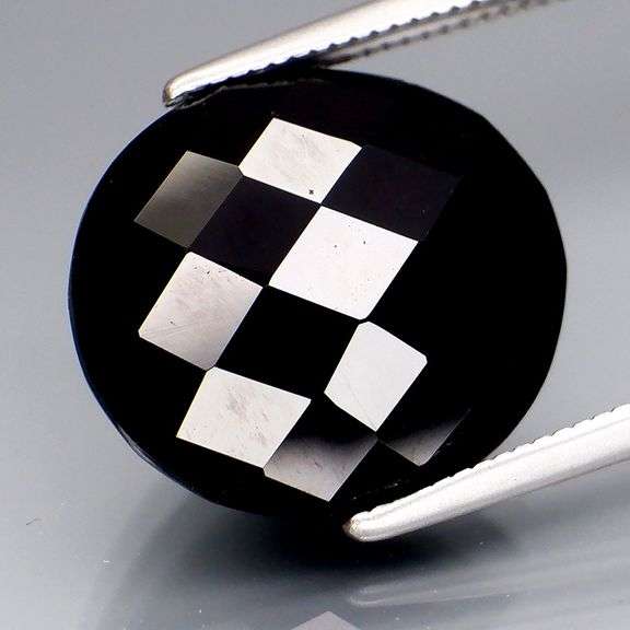 Elegant 8.02ct silky black Loas Tektite