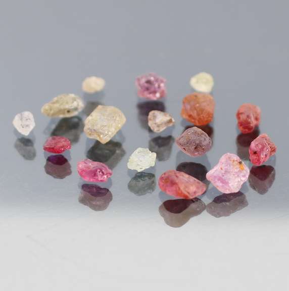 Mixed 16pc. 10.68ct unheated uncut Sapphire set