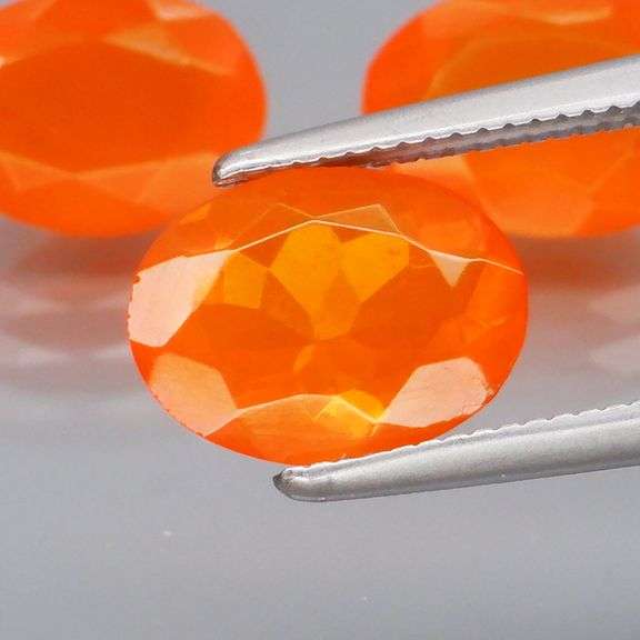 Glistening 3.24ct natural orange Fire Opal set