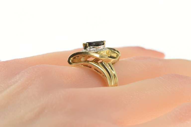 10K Yellow Gold Marquise Sapphire Baguette Diamond Halo Ring
