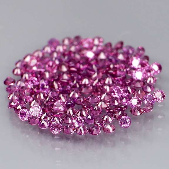 Diamond cut 3.08ct violet pink Rhodolite Garnet set