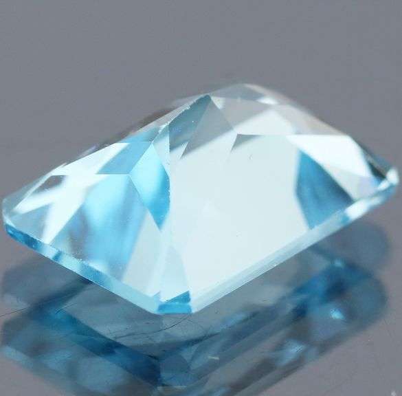 Vivid! 8.78ct radiant cut Swiss blue Topaz