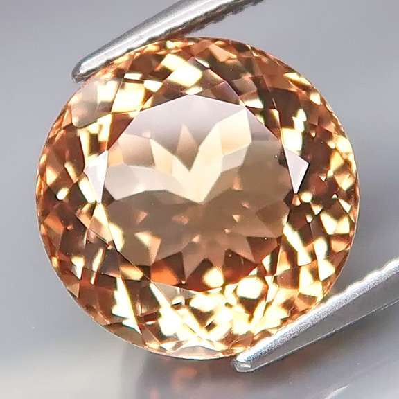 Impressive 8.54ct full fire eye clean Imperial Topaz solitaire