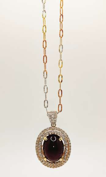 Beautiful 23.0 Carat Star Ruby and White Sapphire Pendant with a Yellow Gold Plated Sterling Sliver Chain.