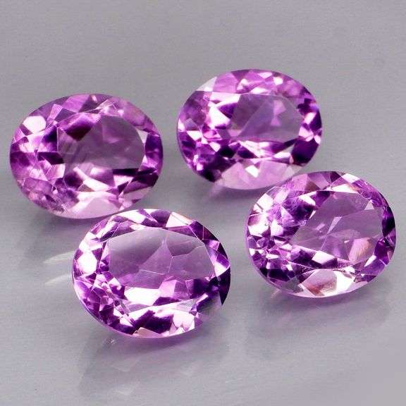Rich 9.37ct top violet Bolivian Amethyst set
