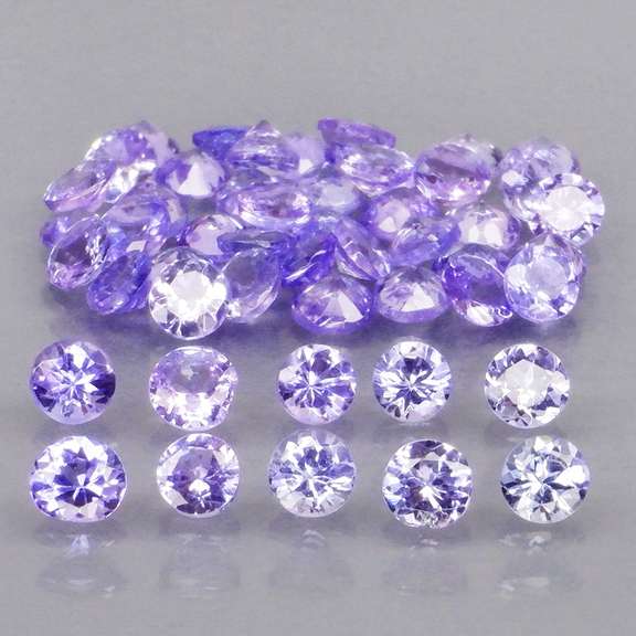 Heavy flashing 4.22ct diamond cut Tanzanite set
