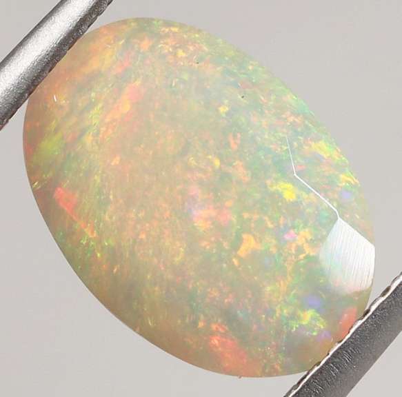 Fully faceted 1.98ct fairy fire Opal