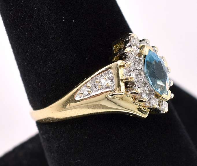 Elegant Blue Topaz And Diamond Ring In 14K Yellow Gold