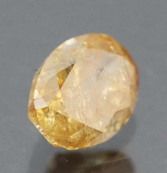 Huge .70ct oval cut yellow Diamond