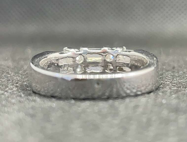 DOT DASH 0.75 C.T. T.W. BAGUETTE AND ROUND DIAMOND CHANNEL BAND IN PLATINUM