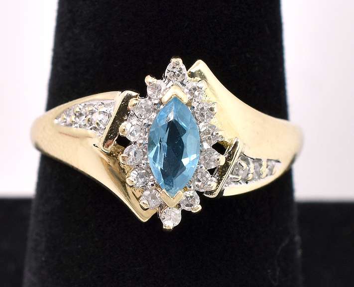 Elegant Blue Topaz And Diamond Ring In 14K Yellow Gold