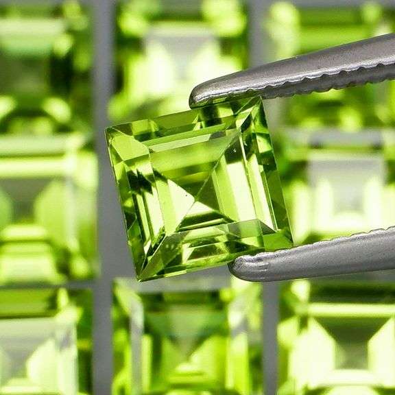 Princess cut 6.91ct apple green Peridot set