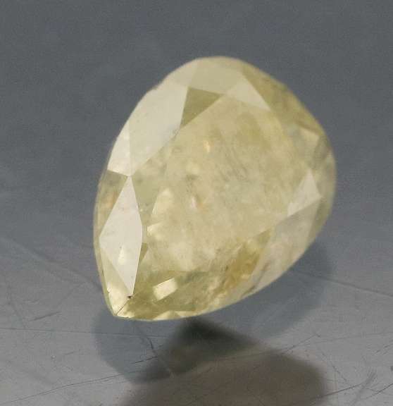 Bright .33ct pear cut yellow Diamond