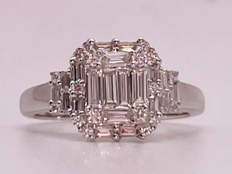 18KT SOLID WHITE GOLD AND DIAMOND RING