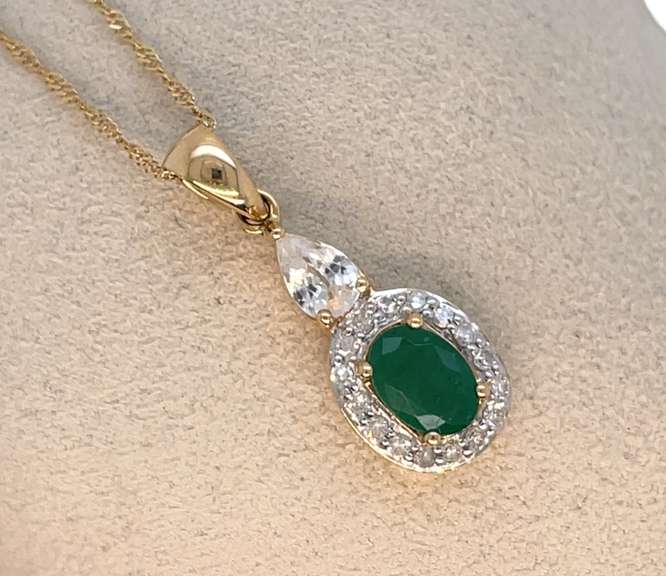 10K GOLD PENDANT WITH EMERALD AND DIAMONDS