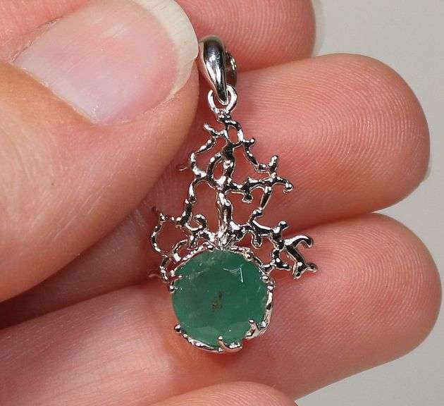 Beautiful sterling silver and Emerald pendant