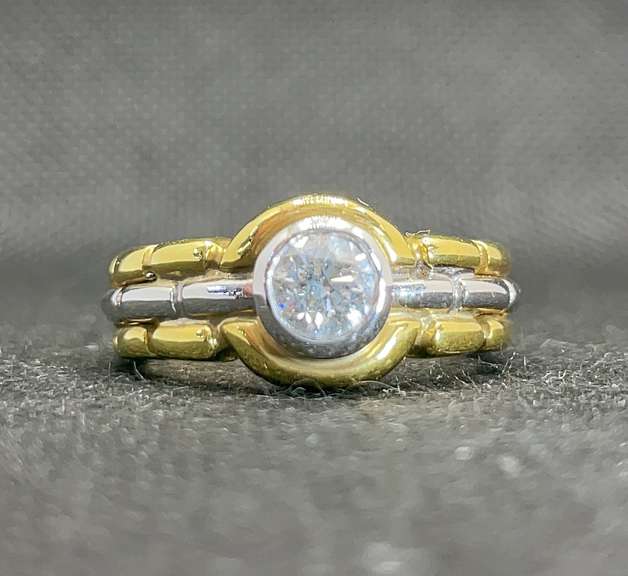 TWO TONE BEZEL SET ROUND DIAMOND ENGAGEMENT RING IN 18K YELLOW GOLD (0.65 C.T. T.W.)