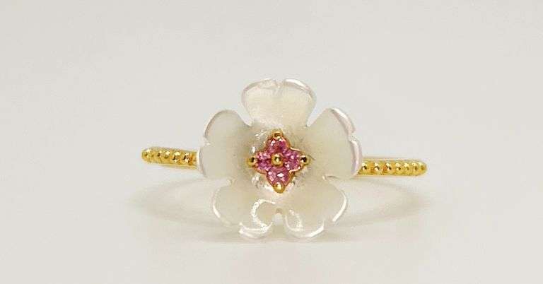 Beautiful Pearlescent Flower Ring with Topaz