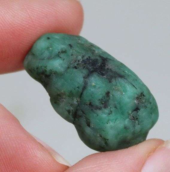 Large 37.81ct raw Emerald in matrix