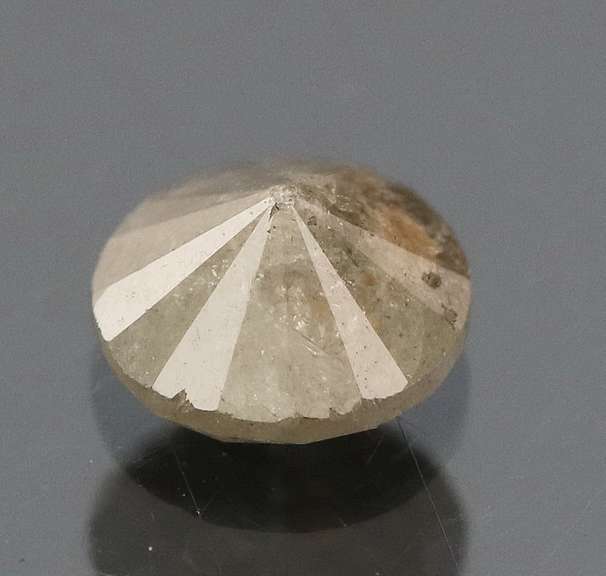 Unique .53ct smooth cut Silver Diamond solitaire