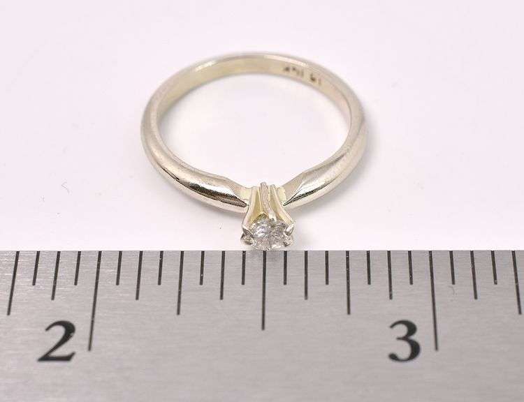 Elegant Solitaire Diamond Ring In 14K White Gold