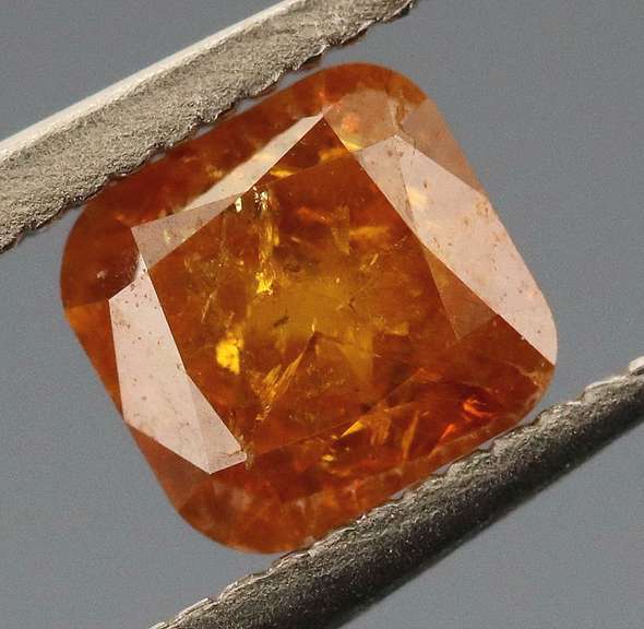 Stunning .51ct cushion cut amber Diamond