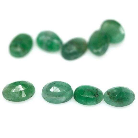Rich emerald green 6.53ct 9pc emerald set