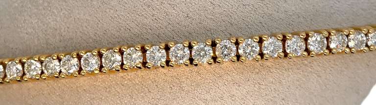 14K YELLOW GOLD TENNIS BRACELET WITH DIAMONDS