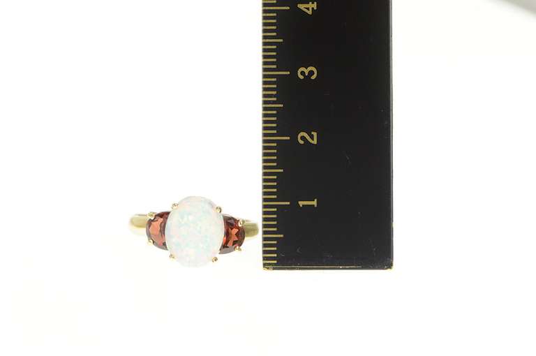 10K Yellow Gold Oval Syn. Opal Garnet Accent Statement Ring