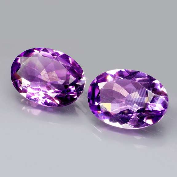 Glittering 9.93ct violet Amethyst pair