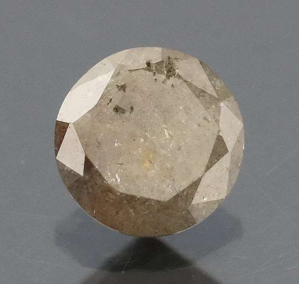 Unique .53ct smooth cut Silver Diamond solitaire