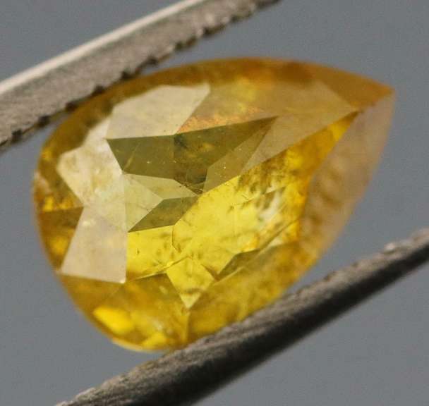 Shimmering .59ct yellow Diamond