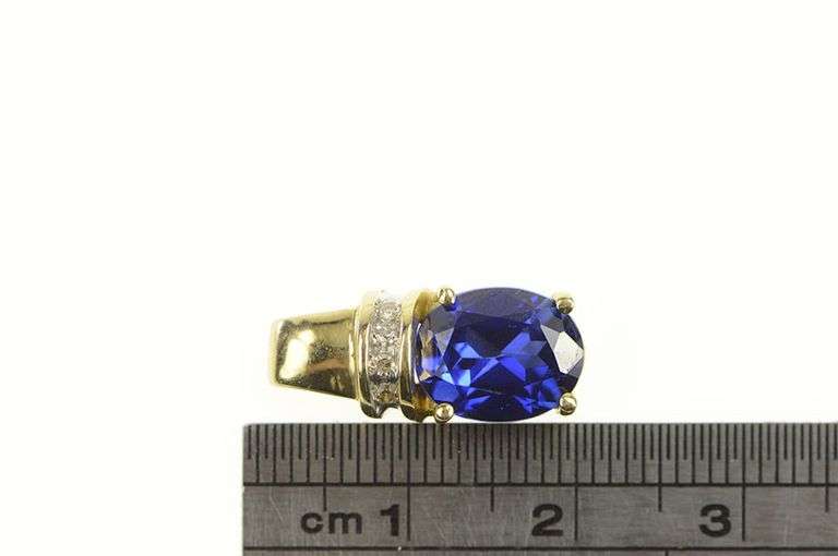 10K Yellow Gold Oval Syn. Sapphire Diamond Accent Classic Pendant