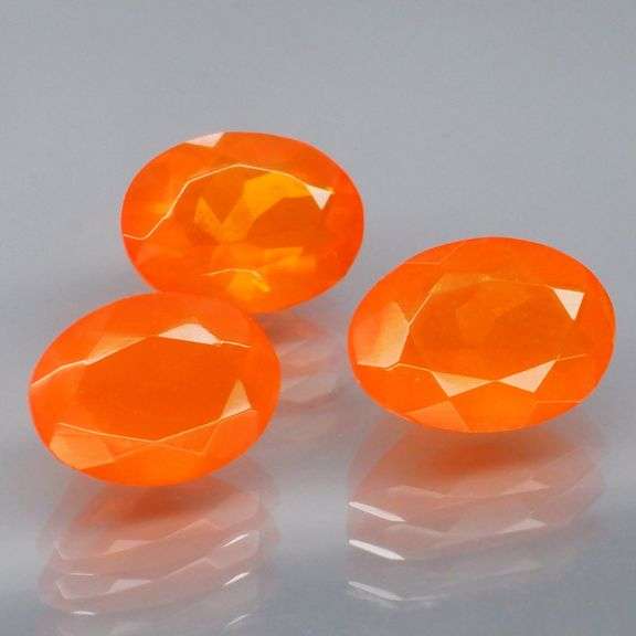 Glistening 3.24ct natural orange Fire Opal set