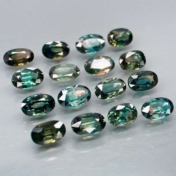 Heated only! 4.48ct blue green Sapphire set