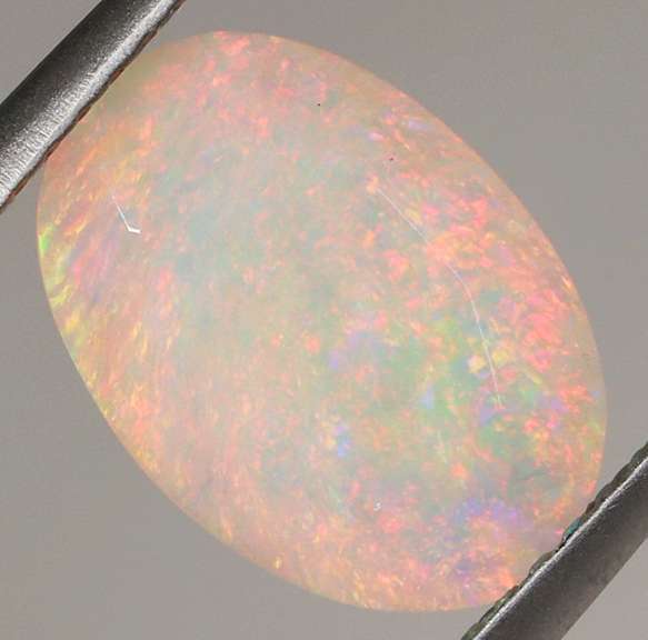 Fully faceted 1.98ct fairy fire Opal