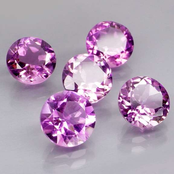 Stunning 8.60ct round cut Bolivian Amethyst set