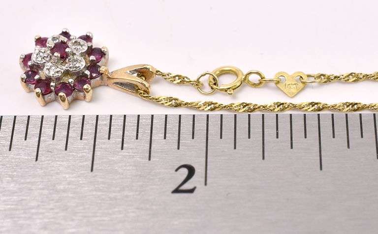 Comely Ruby And Diamond Pendant Necklace In 14K Yellow Gold