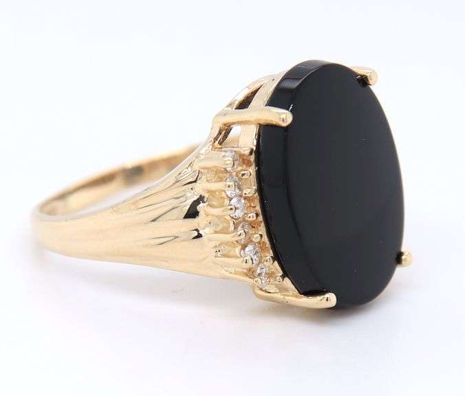 Attractive Black Onyx and Diamond Accent Ring in Yellow Gold