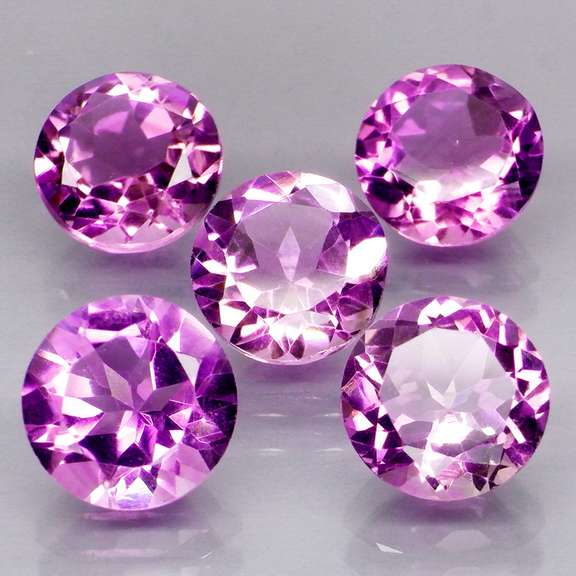 Stunning 8.60ct round cut Bolivian Amethyst set